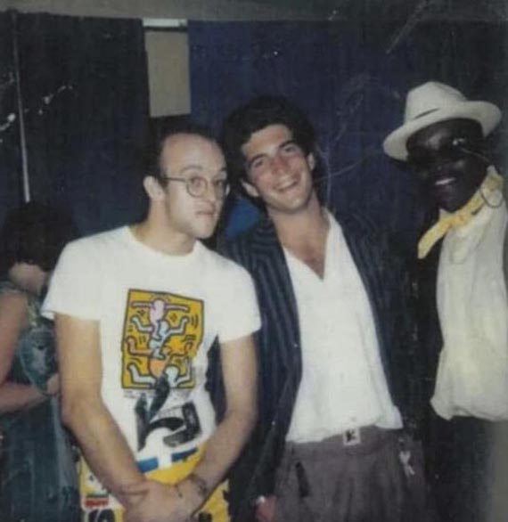 Illustration for: Keith Haring, John F. Kennedy Jr. and Fred Brathwaite a. k. a. "Fab 5 Freddy", backstage at Madison Square Garden for Madonna's "Virgin Tour" concert in New York City, June 1985.