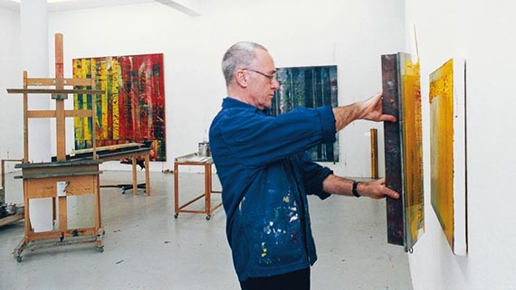 Illustration for: Gerhard Richter in his studio, painting with the squeegee in 1992. © Gerhard Richter